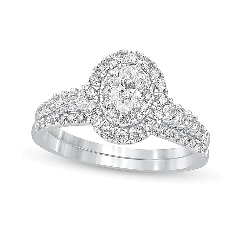 1.0 CT. TW Oval Diamond Frame Bridal Set in 10K White Gold