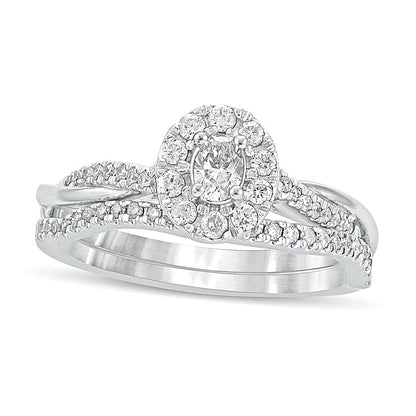 0.5 CT. TW Oval Diamond Frame Twist Shank Bridal Set in 10K White Gold