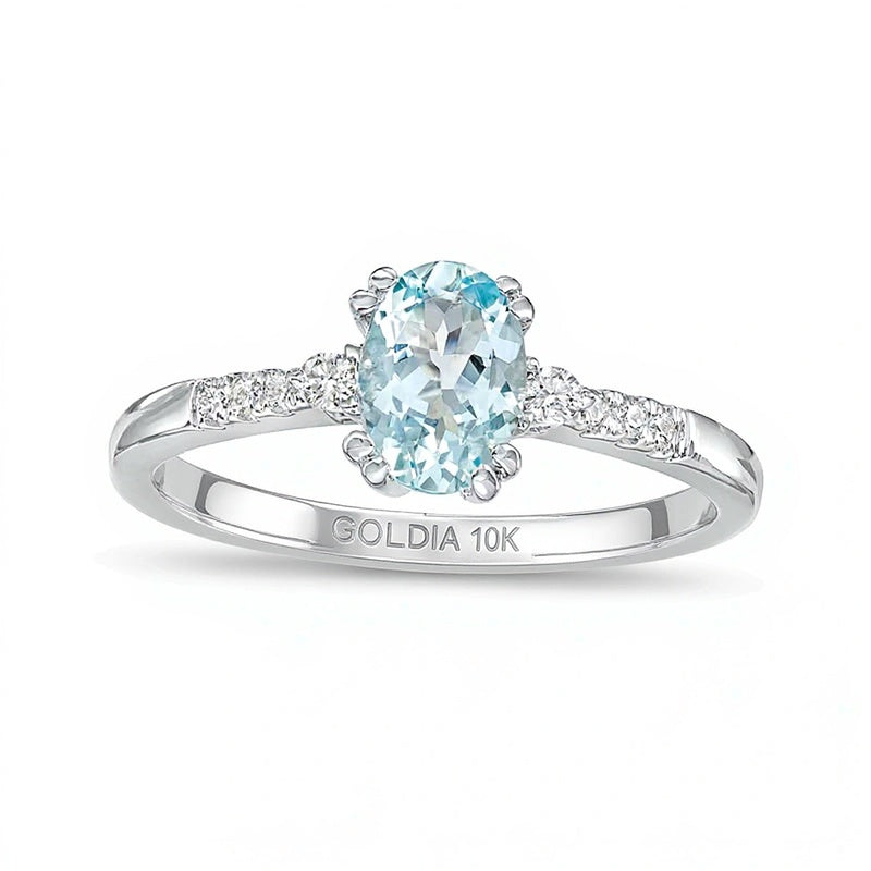 Oval Aquamarine and 0.1 CT. TW Diamond Ring in 10K White Gold