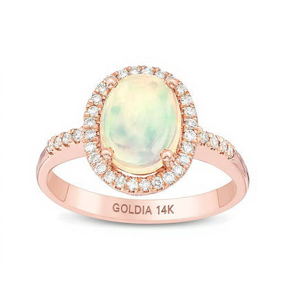 Oval Opal and 0.17 CT. TW Diamond Frame Ring in 14K Rose Gold