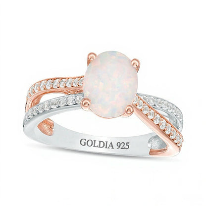 Oval Opal and 0.25 CT. TW Diamond Crossover Ring in Sterling Silver and Rose Rhodium