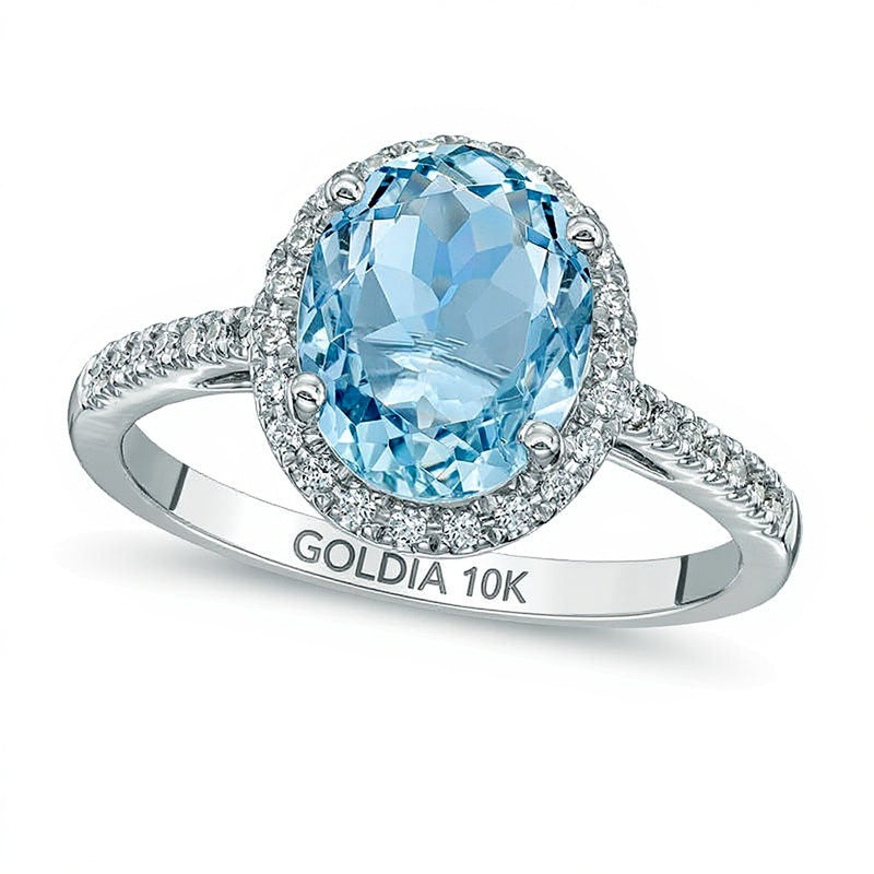 Oval Aquamarine and 0.2 CT. TW Diamond Frame Engagement Ring in 10K White Gold