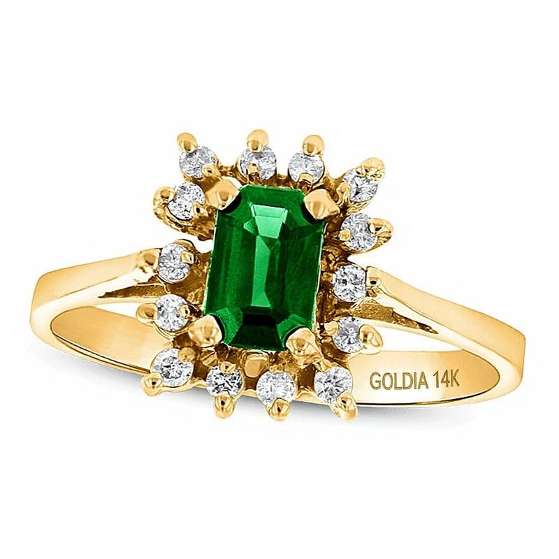 Emerald-Cut Emerald and 0.13 CT. TW Diamond Starburst Frame Ring in 14K Gold