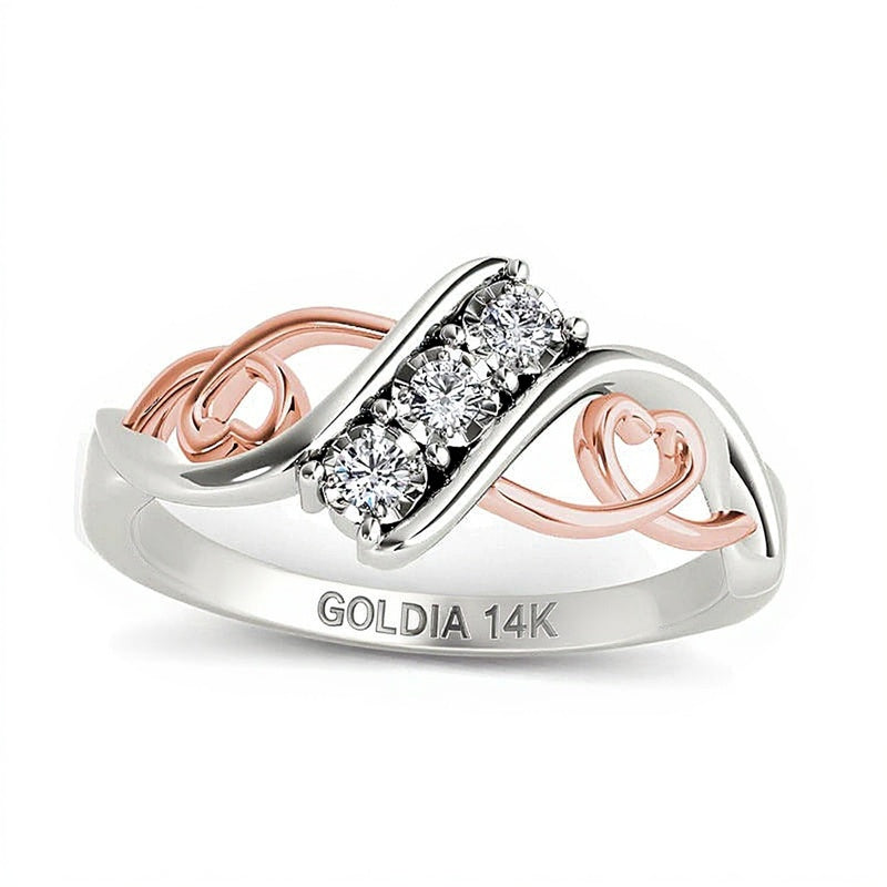 0.1 CT. TW Diamond Three Stone Bypass with Hearts Ring in 14K White Gold and Rose Rhodium