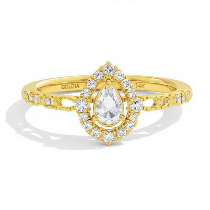 0.5 CT. TW Pear-Shaped Diamond Frame Engagement Ring in 14K Yellow Gold (I/I1)