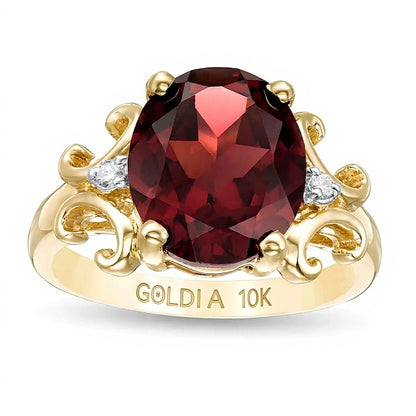 Oval Garnet and 0.05 CT. TW Diamond Scroll Frame Ring in 10K Gold