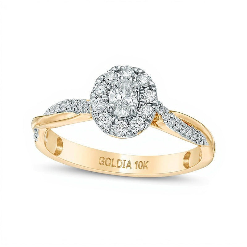 0.38 CT. TW Oval Diamond Frame Twist Engagement Ring in 10K Gold