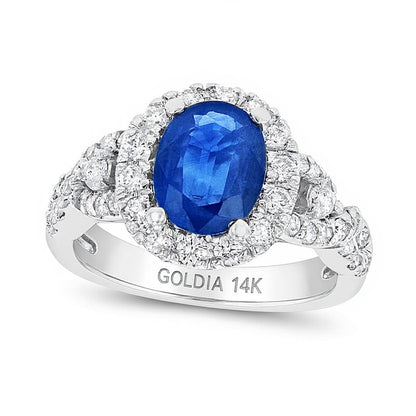Oval Blue Sapphire and 0.75 CT. TW Diamond Frame Twist Shank Ring in 14K White Gold