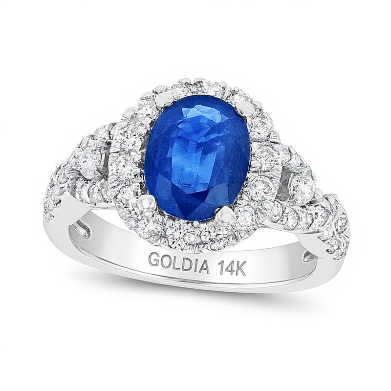 Oval Blue Sapphire and 0.75 CT. TW Diamond Frame Twist Shank Ring in 14K White Gold