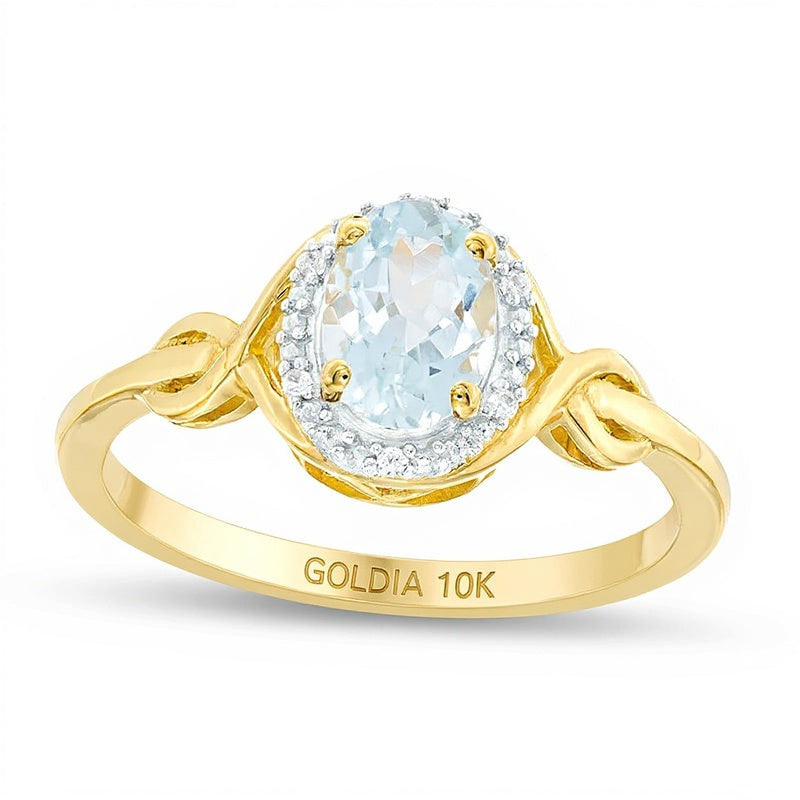 Oval Aquamarine and Diamond Accent Twist Ring in 10K Gold
