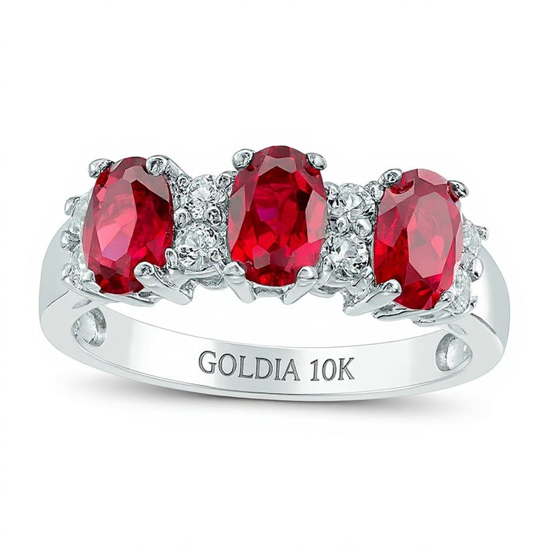 Oval Lab-Created Ruby and White Sapphire Three Stone Ring in 10K White Gold