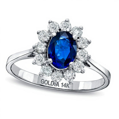 Oval Blue Sapphire and 0.5 CT. TW Diamond Frame Engagement Ring in 14K White Gold