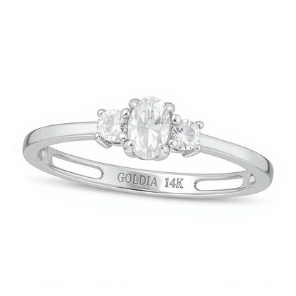 0.5 CT. TW Oval and Round Diamond Three Stone Engagement Ring in 14K White Gold