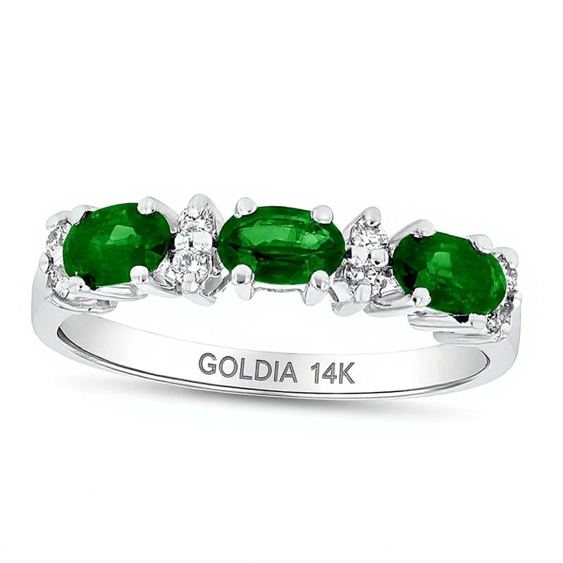 Sideways Oval Emerald and 0.1 CT. TW Diamond Three Stone Ring in 14K White Gold