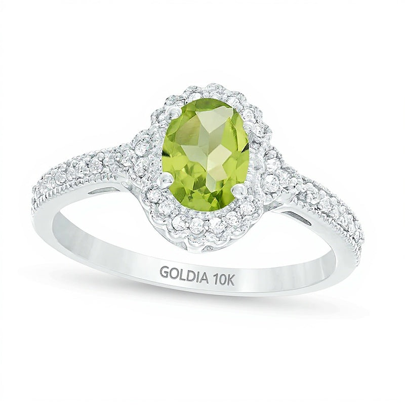 Oval Peridot and 0.13 CT. TW Diamond Frame Vintage-Style Ring in 10K White Gold