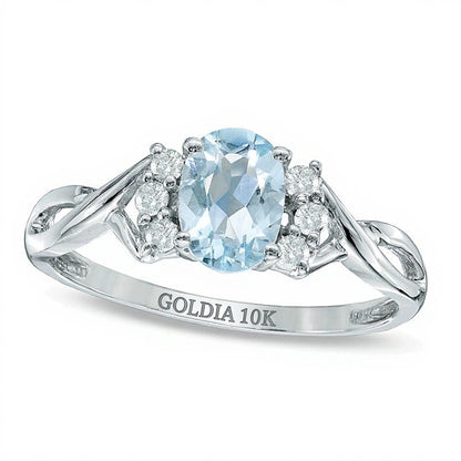 Oval Aquamarine and 0.13 CT. TW Diamond Ring in 10K White Gold
