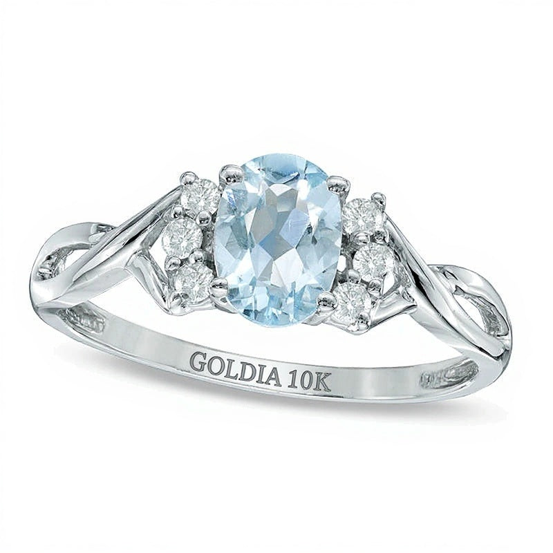 Oval Aquamarine and 0.13 CT. TW Diamond Ring in 10K White Gold