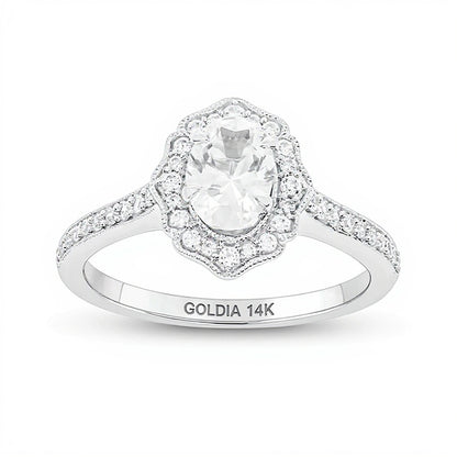 0.75 CT. TW Oval Diamond Flower Frame Vintage-Style Engagement Ring in 14K White Gold (I/I2)