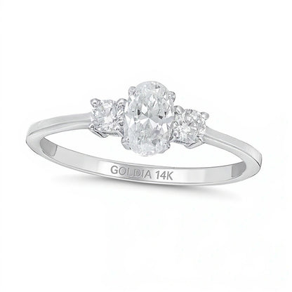 0.63 CT. TW Oval and Round Diamond Three Stone Engagement Ring in 14K White Gold