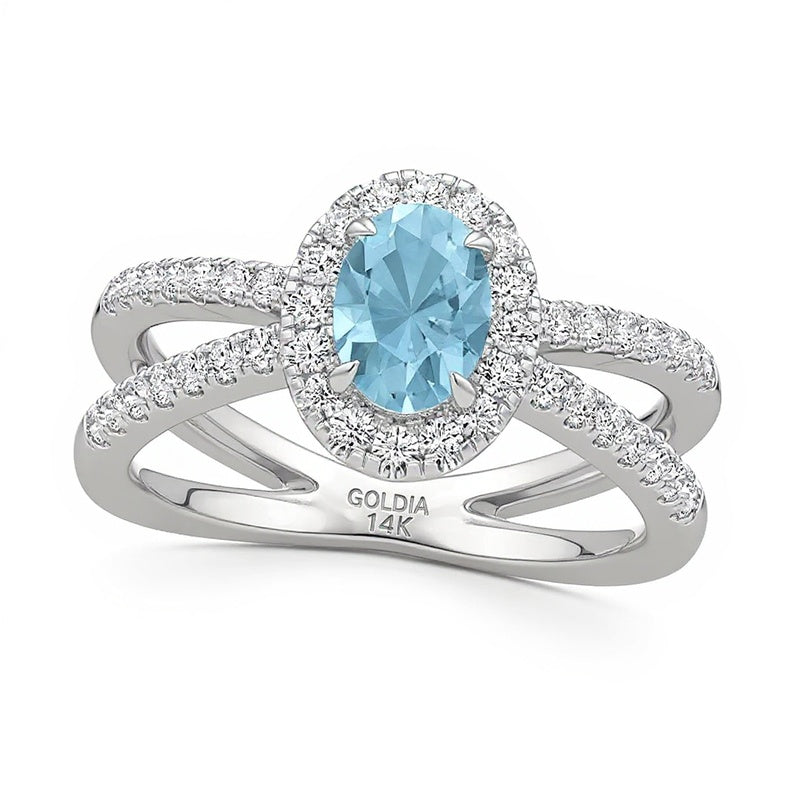 Oval Aquamarine and 0.33 CT. TW Lab-Grown Diamond Frame Orbit Split Shank Ring in 14K White Gold