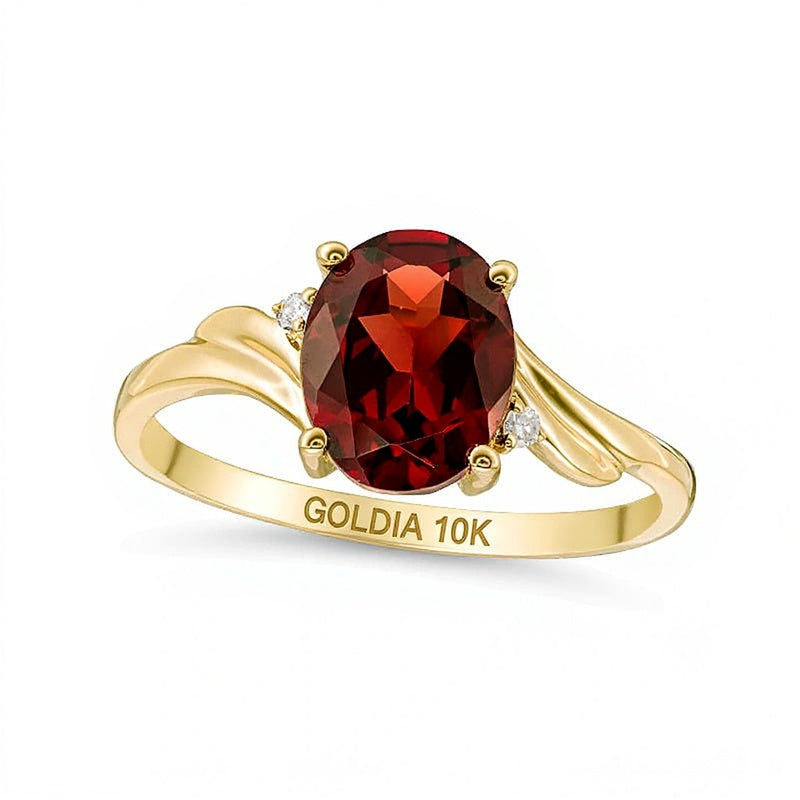 Oval Garnet and Diamond Accent Bypass Swirl Shank Ring in 10K Gold