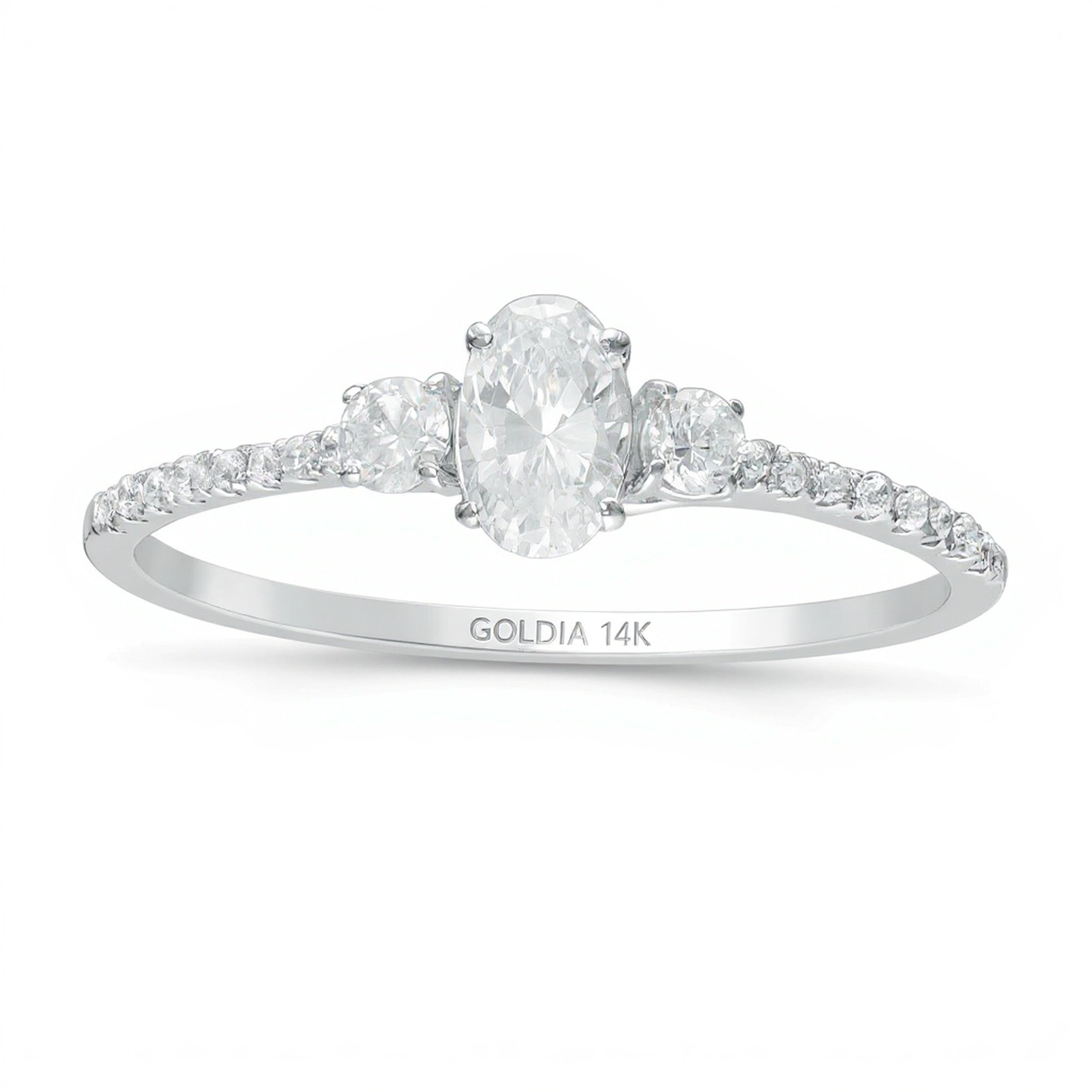 0.63 CT. TW Oval and Round Diamond Three Stone Engagement Ring in 14K White Gold