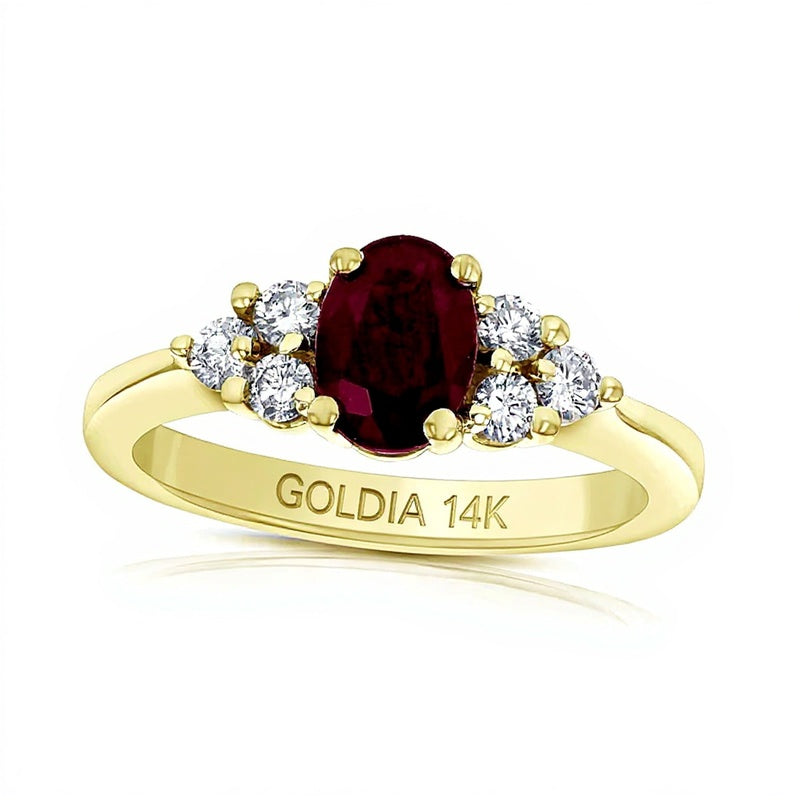 Oval Ruby and 0.33 CT. TW Diamond Tri-Sides Engagement Ring in 14K Gold