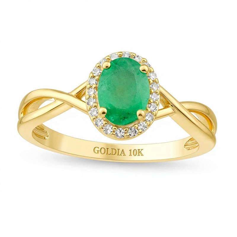 Oval Emerald and 0.07 CT. TW Diamond Frame Twist Shank Ring in 10K Gold