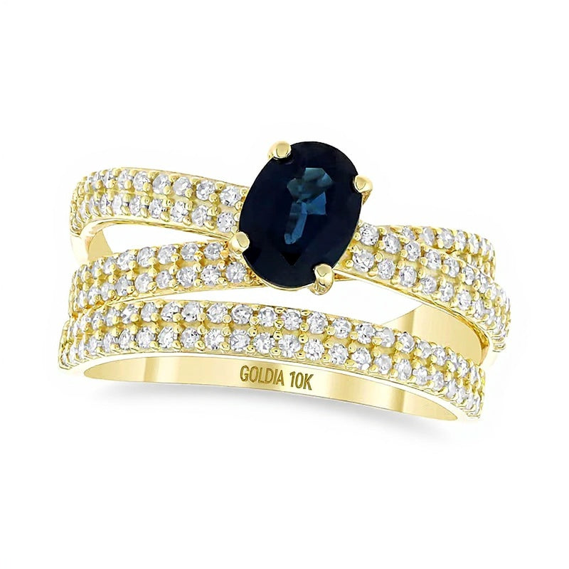Oval Blue Sapphire and 0.63 CT. TW Diamond Double Row Crossover Orbit Ring in 10K Gold