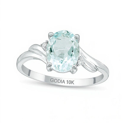 Oval Aquamarine and Diamond Accent Bypass Swirl Shank Ring in 10K White Gold