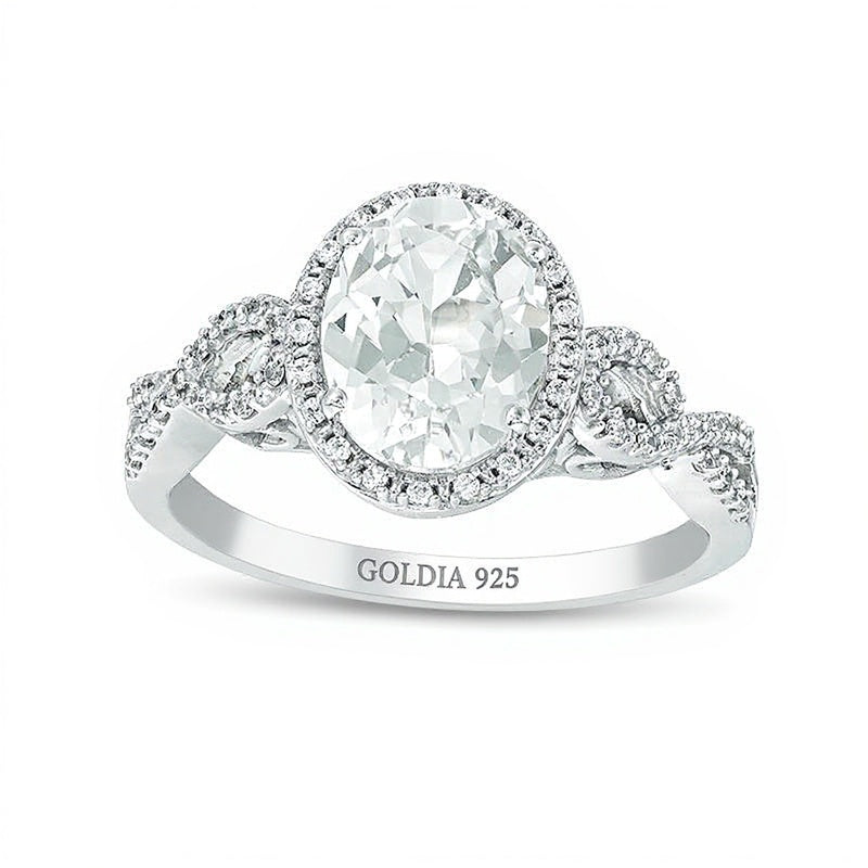 Oval Lab-Created White Sapphire and 0.17 CT. TW Diamond Frame Infinity Shank Engagement Ring in Sterling Silver