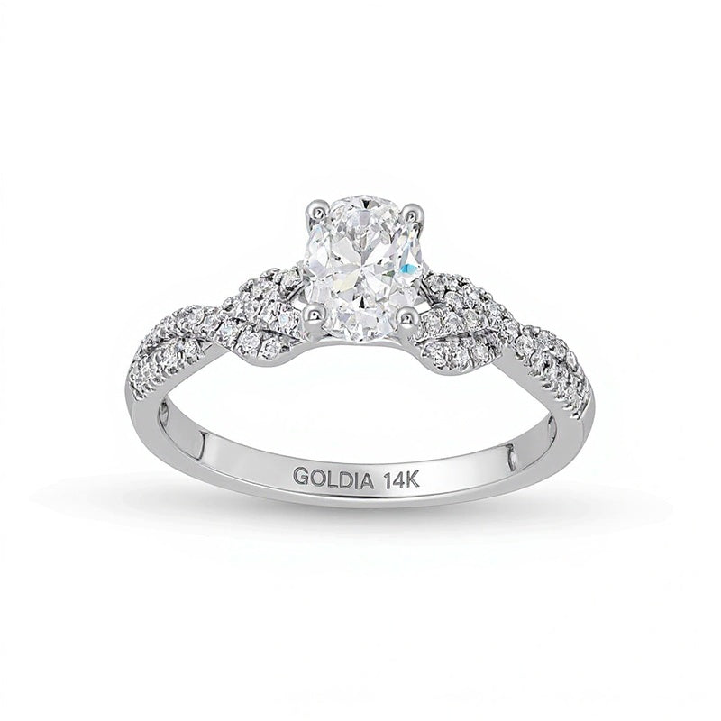 0.75 CT. TW Oval Diamond Twist Shank Engagement Ring in 14K White Gold