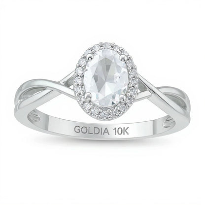 Oval Aquamarine and 0.07 CT. TW Diamond Frame Twist Shank Ring in 10K White Gold