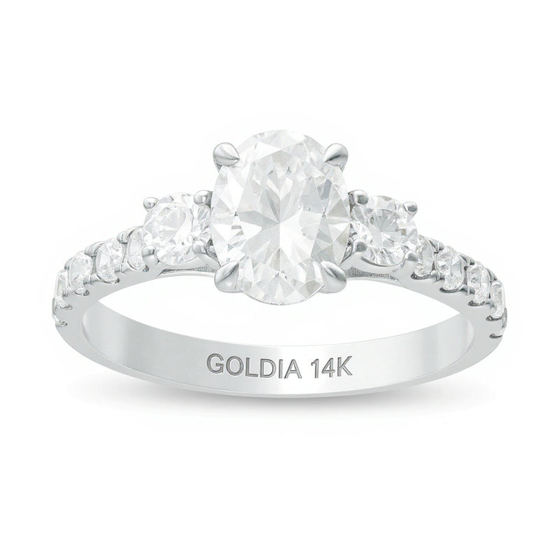 1.75 CT. TW Oval and Round Diamond Three Stone Engagement Ring in 14K White Gold