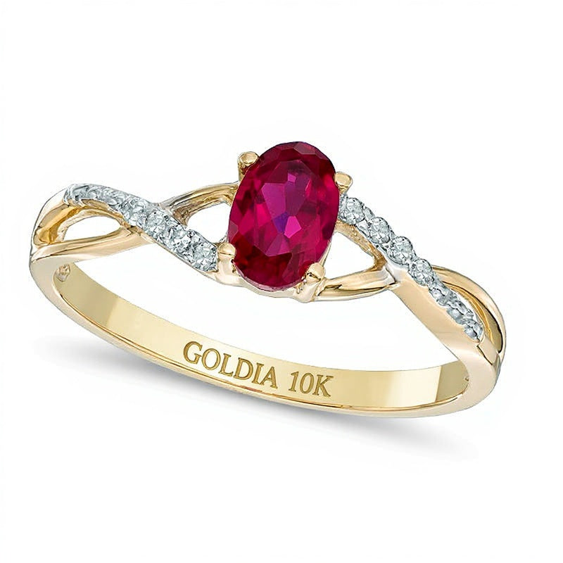 Oval Lab-Created Ruby and Diamond Accent Twist Engagement Ring in 10K Gold