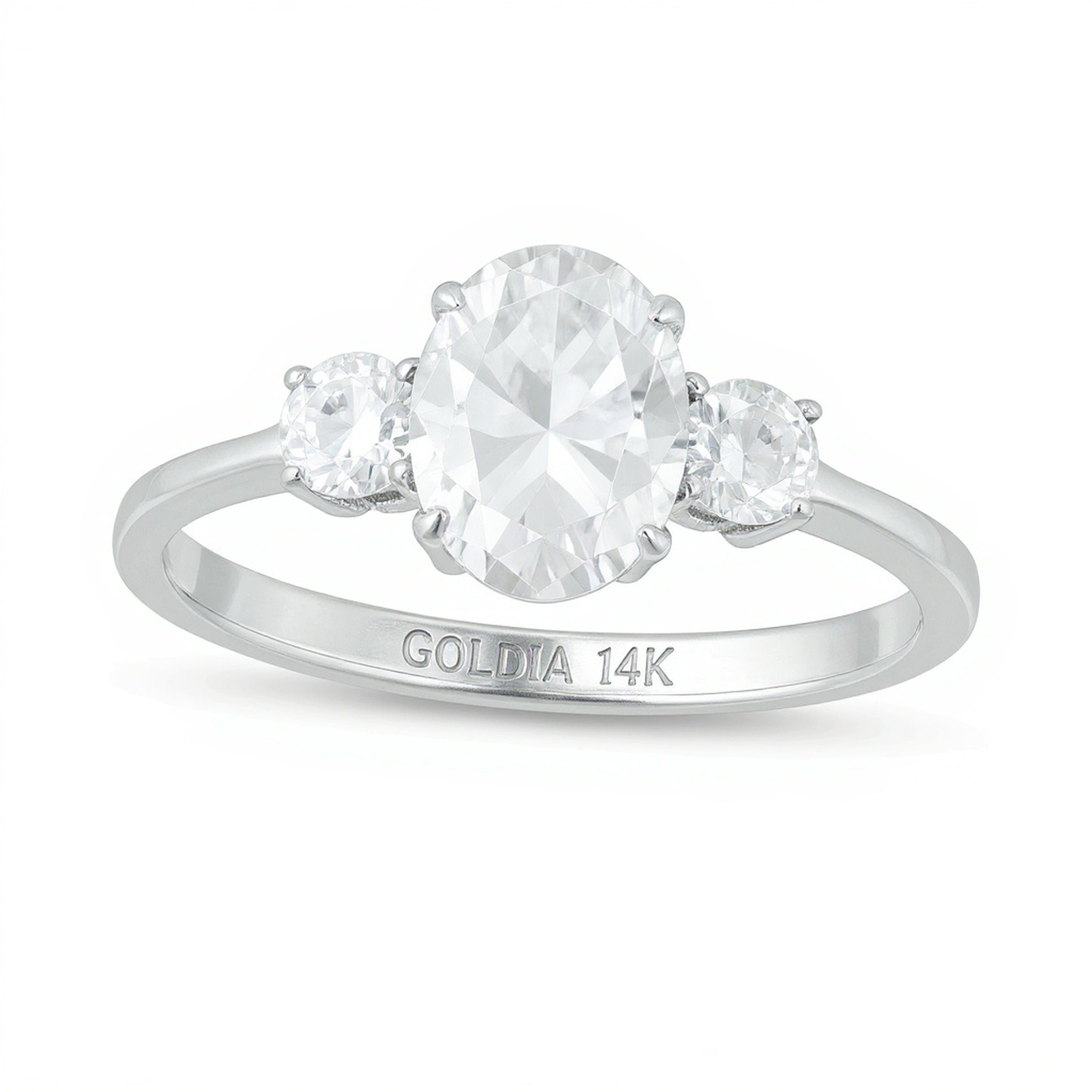 1.25 CT. TW Oval and Round Diamond Three Stone Engagement Ring in 14K White Gold