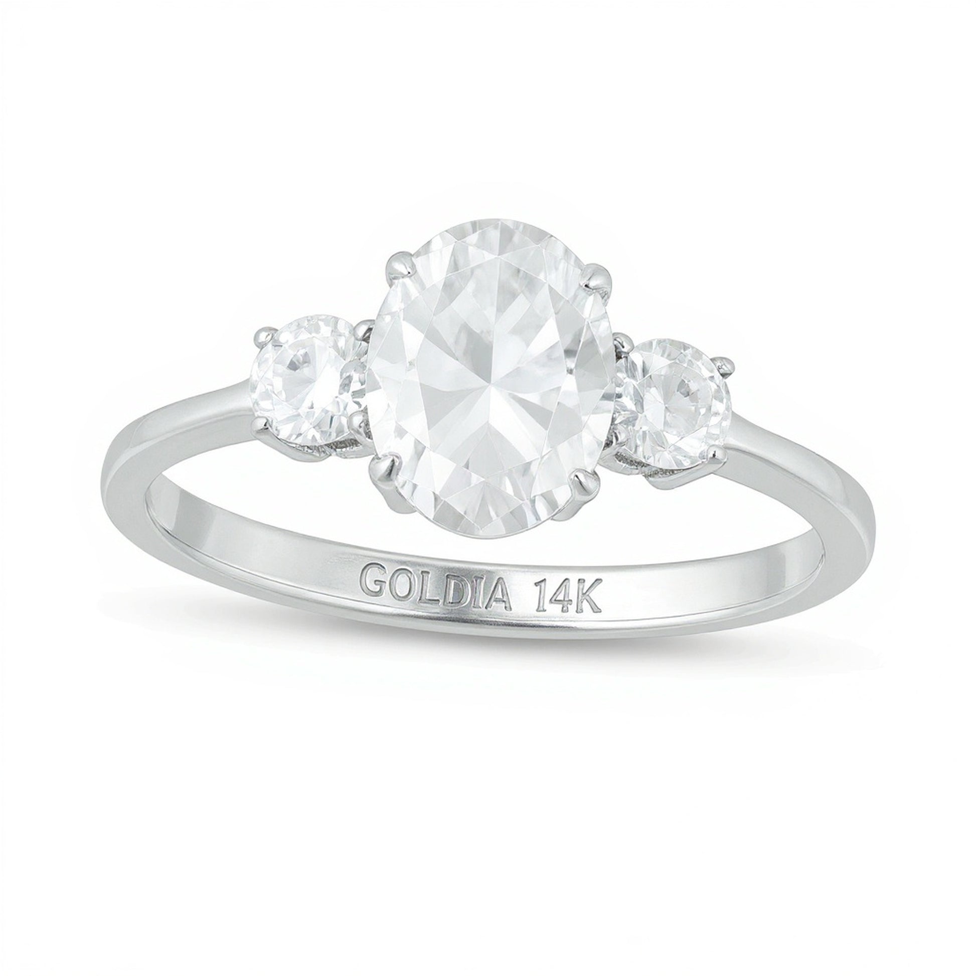 1.25 CT. TW Oval and Round Diamond Three Stone Engagement Ring in 14K White Gold