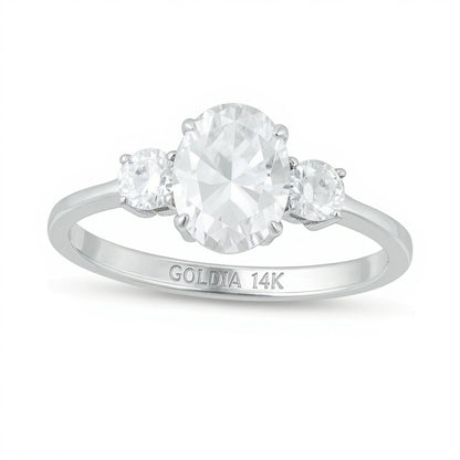 1.25 CT. TW Oval and Round Diamond Three Stone Engagement Ring in 14K White Gold