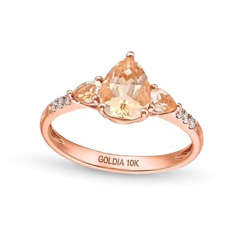 Pear-Shaped Morganite and 0.07 CT. TW Diamond Three Stone Ring in 10K Rose Gold