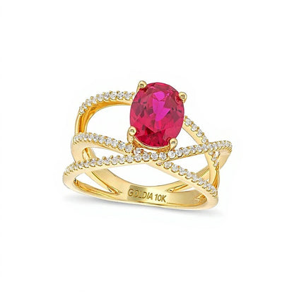 Oval Lab-Created Ruby and White Lab-Created Sapphire Orbit Ring in 10K Gold