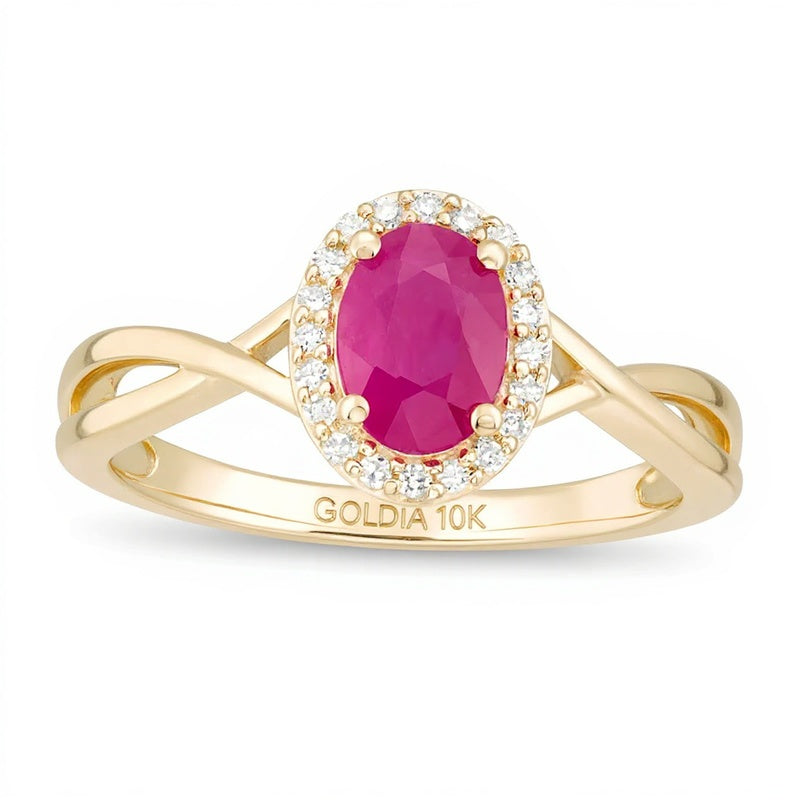 Oval Ruby and 0.07 CT. TW Diamond Frame Twist Shank Ring in 10K Gold