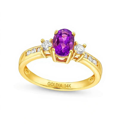 Oval Amethyst and 0.25 CT. TW Diamond Three Stone Ring in 14K Gold