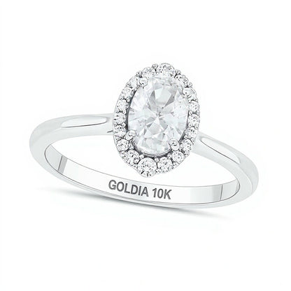 Oval White Lab-Created Sapphire and 0.17 CT. TW Diamond Frame Engagement Ring in 10K White Gold