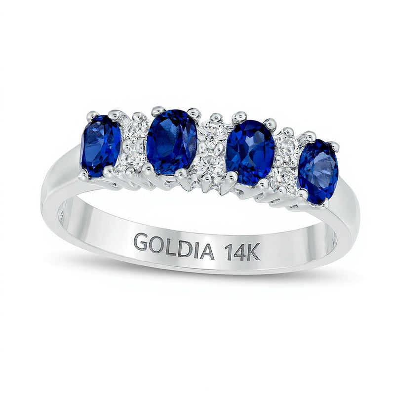 Oval Blue Sapphire and 0.1 CT. TW Diamond Duo Alternating Four Stone Ring in 14K White Gold