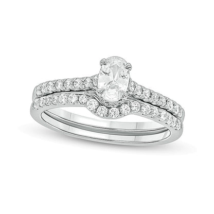 1.0 CT. TW Oval Diamond Bridal Set in 14K White Gold (I/I2)