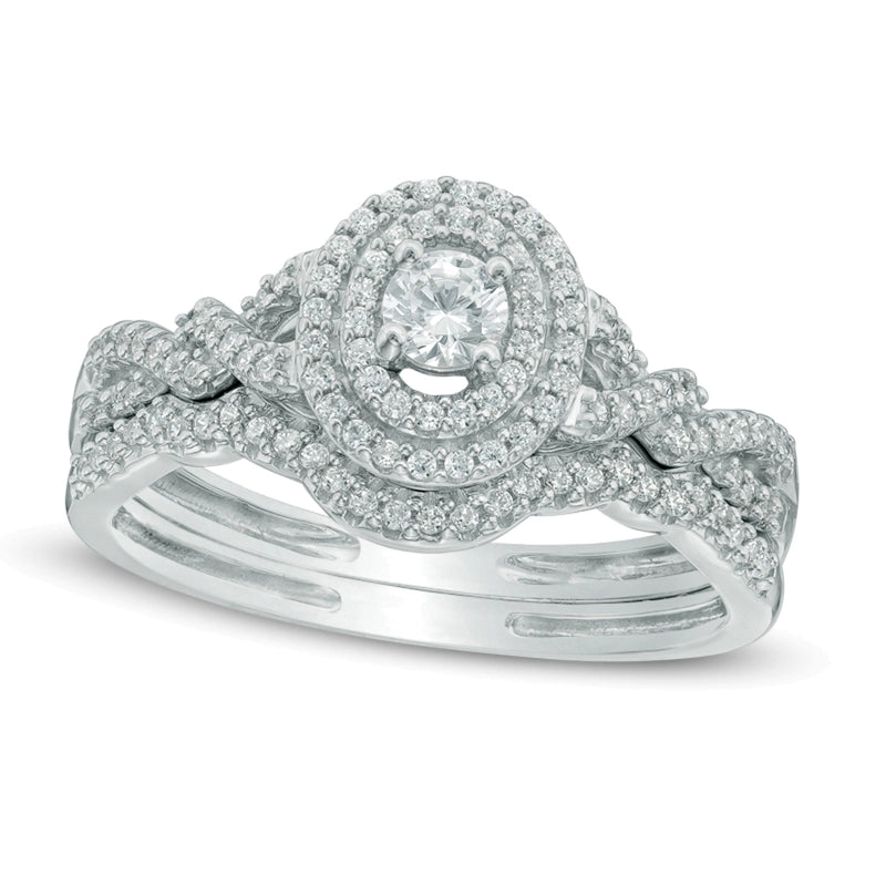 0.5 CT. TW Diamond Oval Frame Loose Braid Bridal Set in 10K White Gold