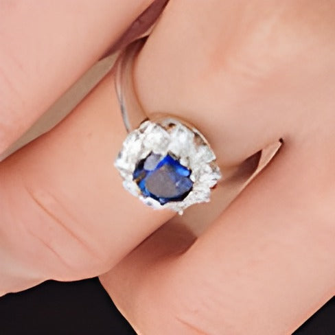 7.0mm Blue Sapphire and 1.0 CT. TW Diamond Sunburst Frame Ring in 14K White Gold