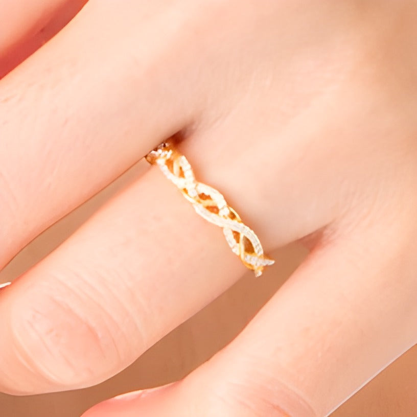 0.17 CT. TW Diamond Twist Anniversary Band in 10K Gold