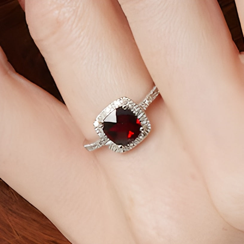7.0mm Cushion-Shaped Garnet and 0.2 CT. TW Diamond Frame Ring in 10K White Gold
