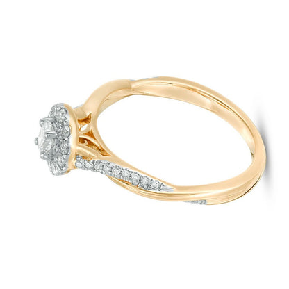 0.38 CT. TW Oval Diamond Frame Twist Engagement Ring in 10K Gold